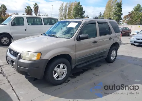 2001 Ford Escape Xlt from USA, damaged, VIN 1FMYU03181KA73971